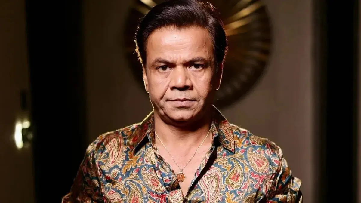 Actor Rajpal Yadav speaks earnestly during a media interview.
