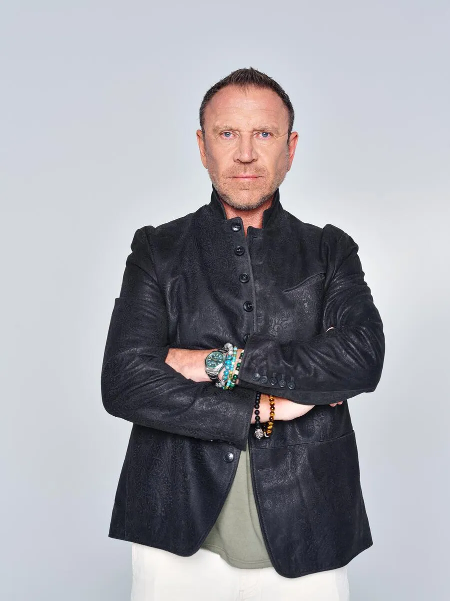 Renny Harlin, director, looking thoughtful.