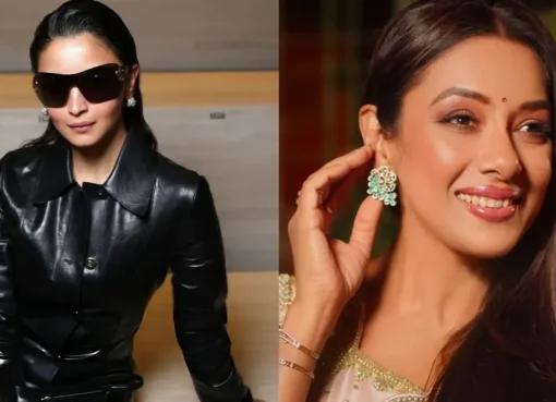 Alia Bhatt posing in a dark, structured Gucci leather outfit at Milan Fashion Week.