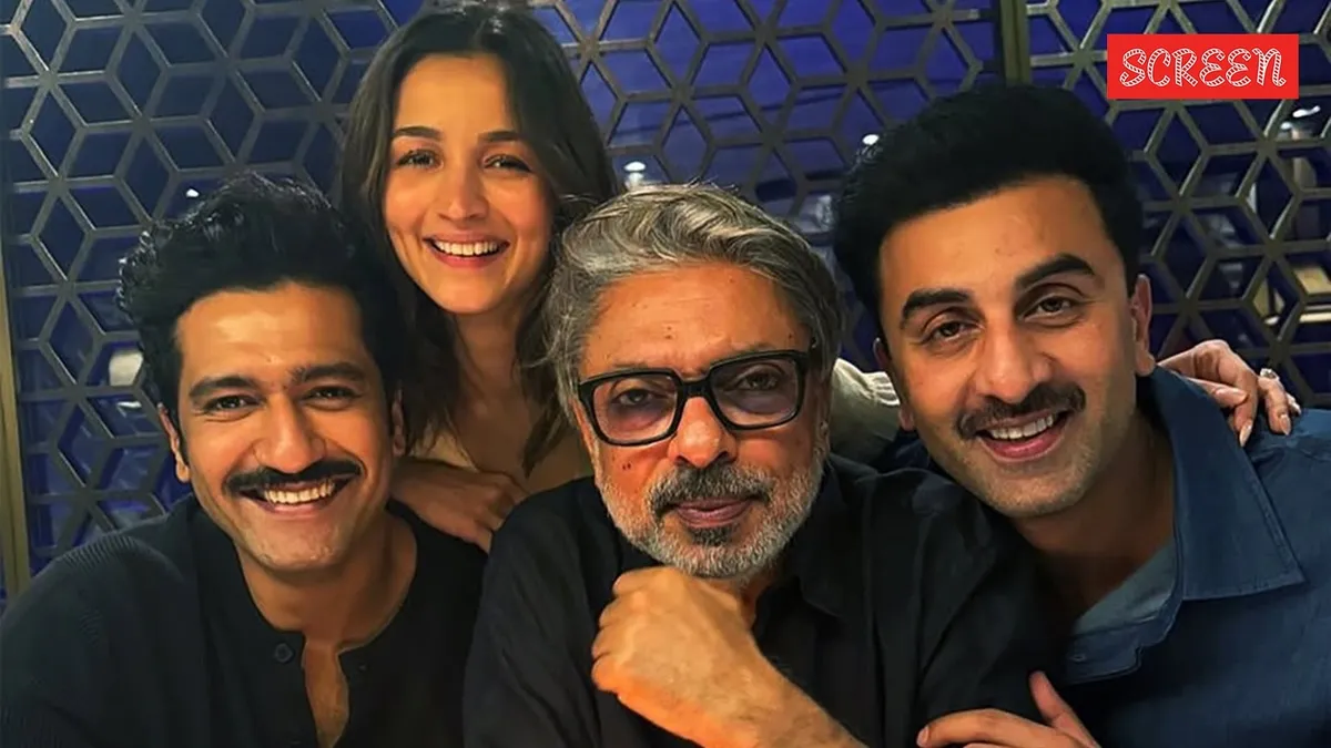 Actors Ranbir Kapoor, Vicky Kaushal, and Alia Bhatt in a movie still.
