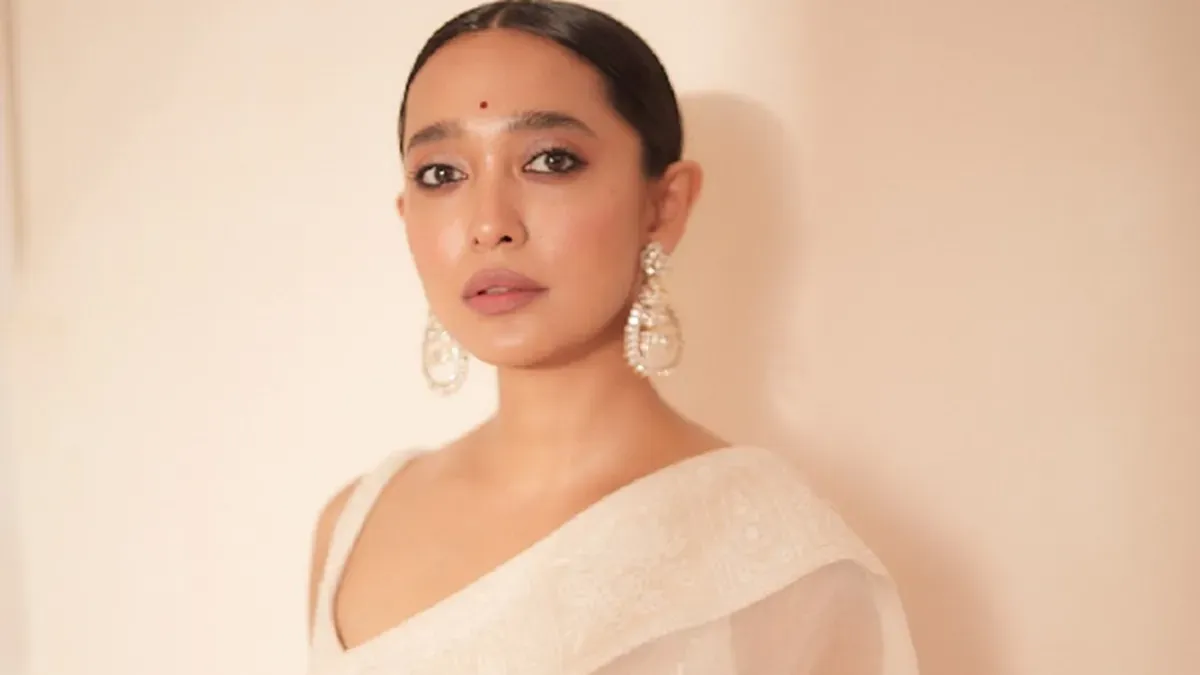 Sayani Gupta smiling.