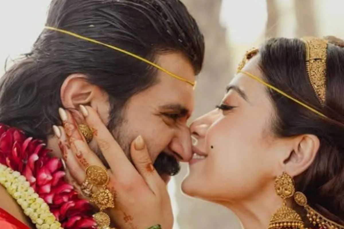 Rashmika Mandanna smiling in traditional Telugu wedding attire.