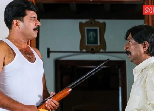 Sreenivasan and Mammootty sharing a stage and talking.