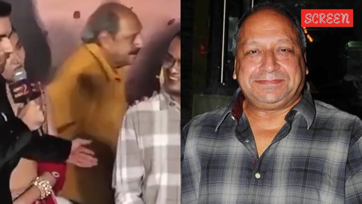 Actor Sudhir Pandey smiling at a trailer launch event.
