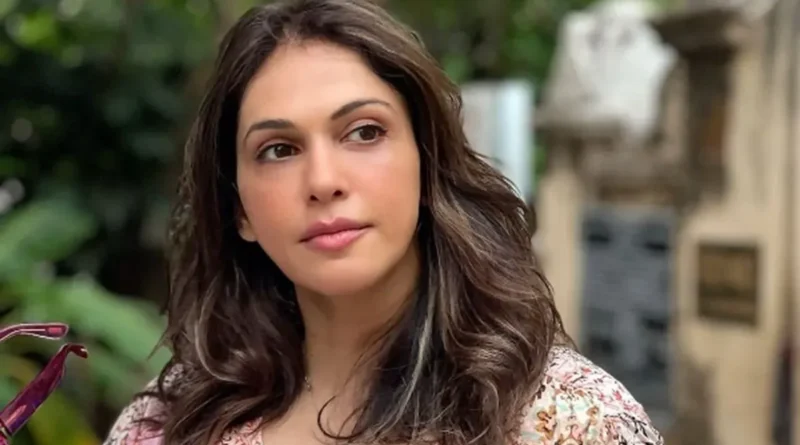 Isha Koppikar reflecting thoughtfully on personal well-being and peace.