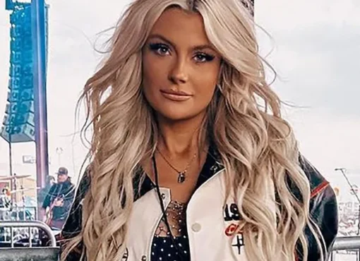 Cameron Grigg and his new fiancée posing together during a sunset engagement shoot.