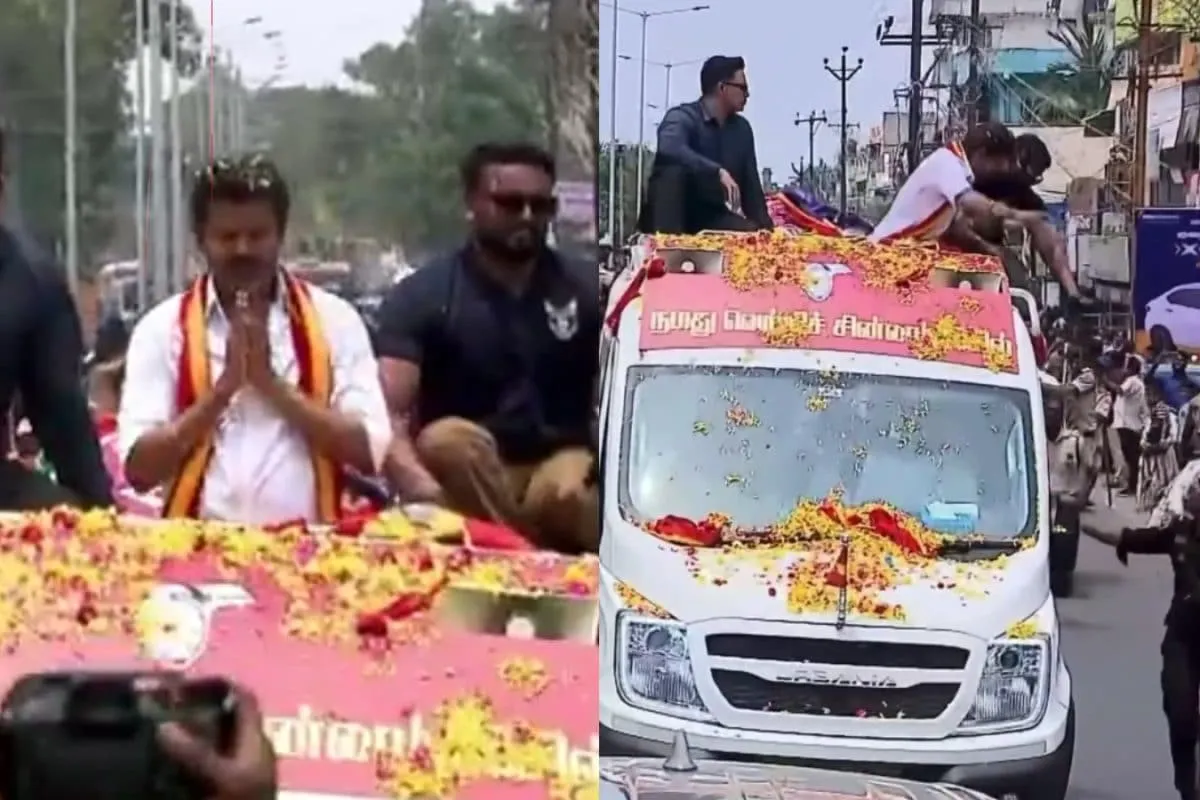 Thalapathy Vijay gesturing angrily at security personnel at a public rally.