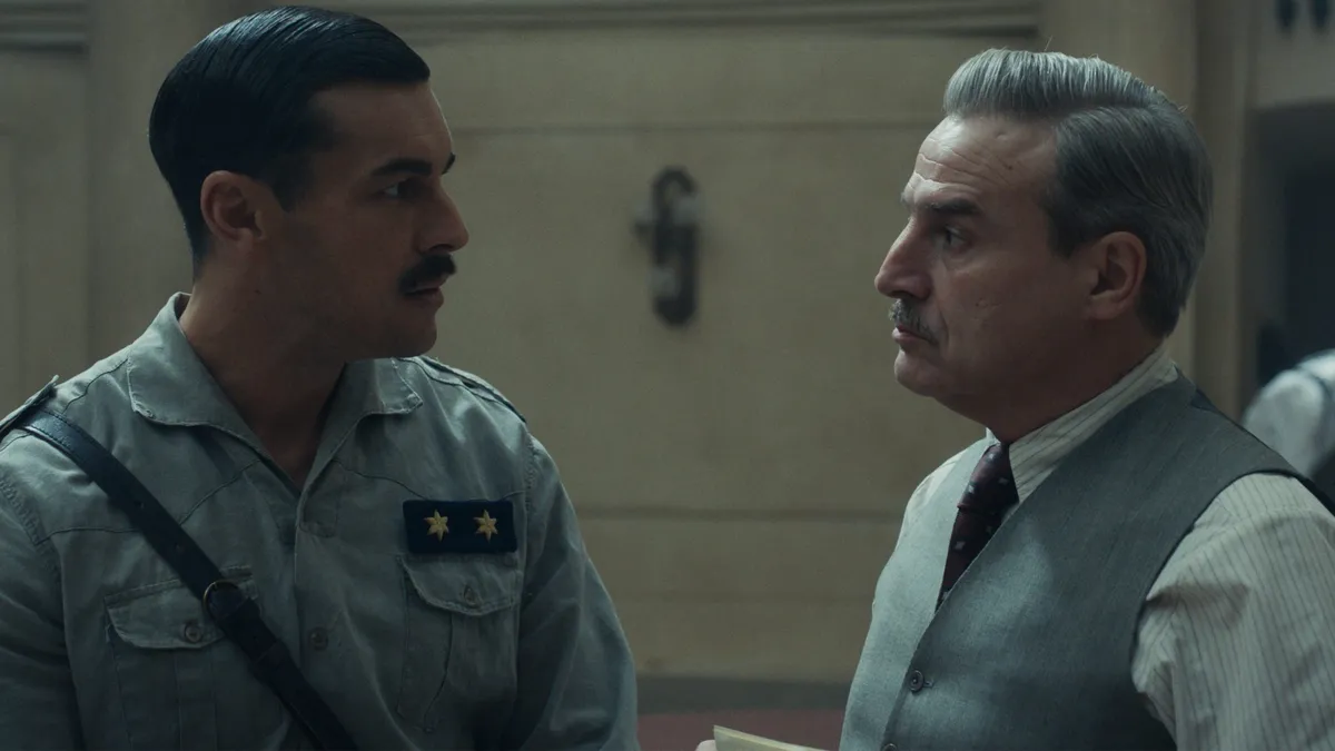 A still from the Spanish film 'The Dinner' showing chefs preparing a meal.