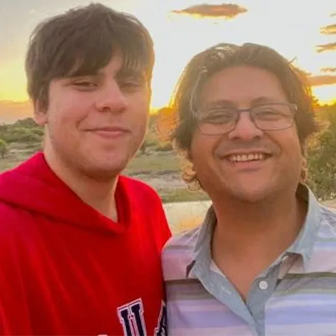 Christine Dawood, looking somber but resilient, sharing her story.