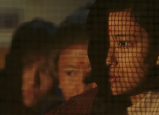 A still image from the film 'Shape of Momo' showing a character.
