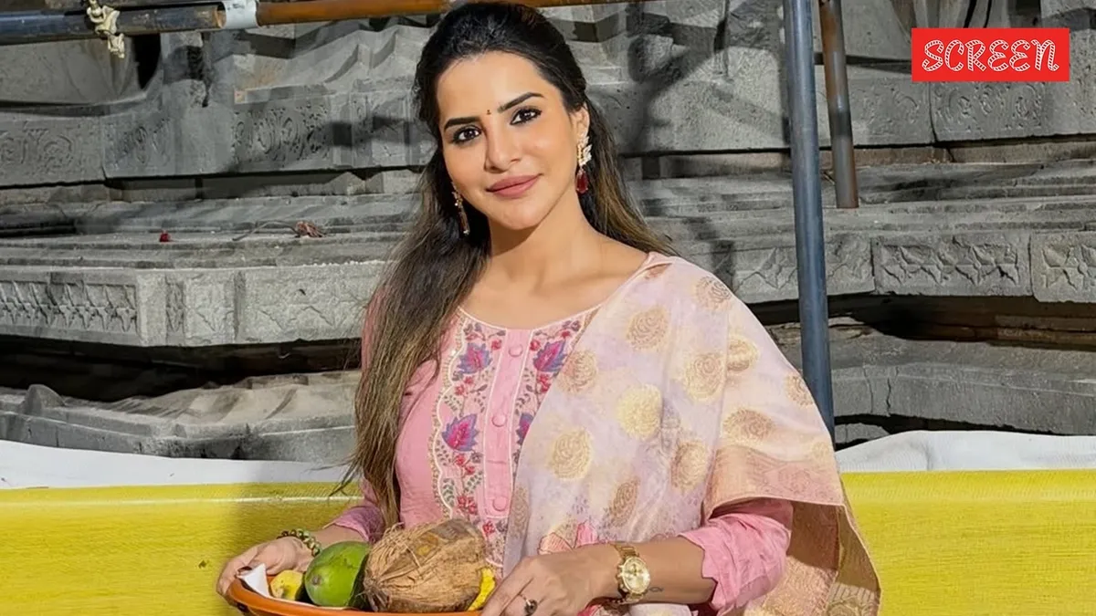 Ashu Reddy looking serious, making a strong statement against fraud allegations.