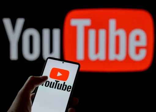 Close up of the YouTube logo on a bright smartphone screen.