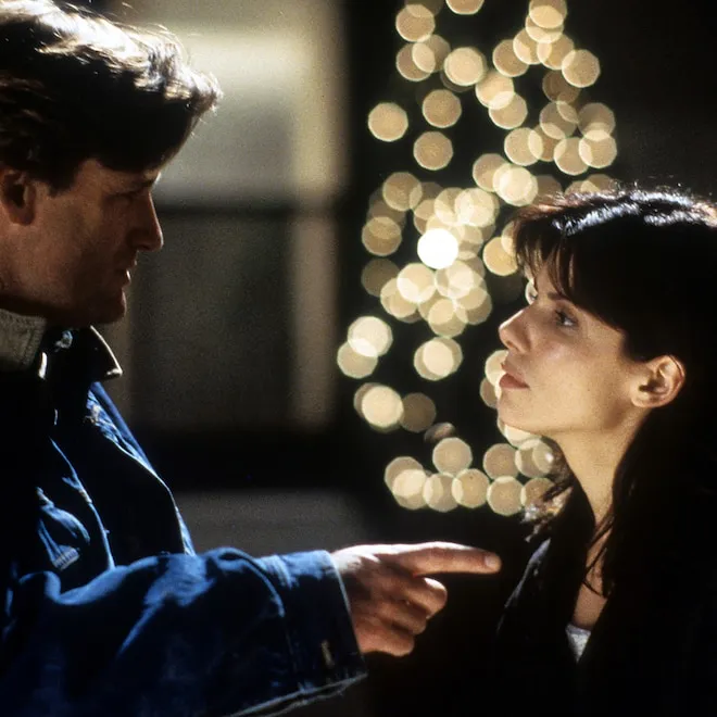 Sandra Bullock smiling and looking relaxed.