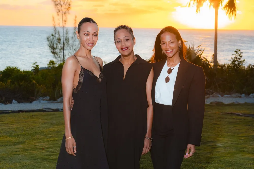 Zoe Saldaña smiling, possibly for a movie announcement.