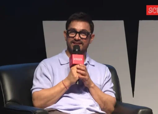 Aamir Khan looking thoughtful during a press interview about his films.