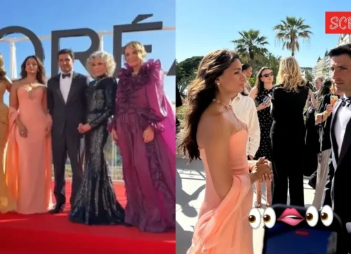 Alia Bhatt smiling next to Carlos Sainz and Heidi Klum at a sunny event