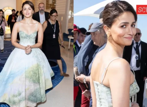 Alia Bhatt smiling in a beautiful, flowing gown at the Cannes Film Festival 2026.