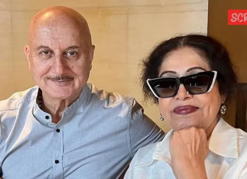 Anupam Kher and Kirron Kher smiling together.