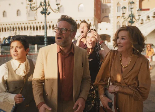Seth Rogen laughing at a Hollywood event