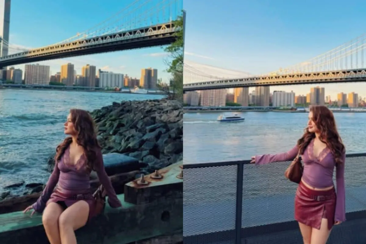 Avneet Kaur poses by the river in a purple lace top and mini skirt.