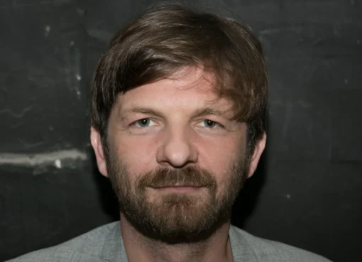 Photo of director Visar Morina looking thoughtful.