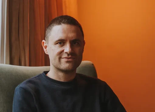 Christian White smiling