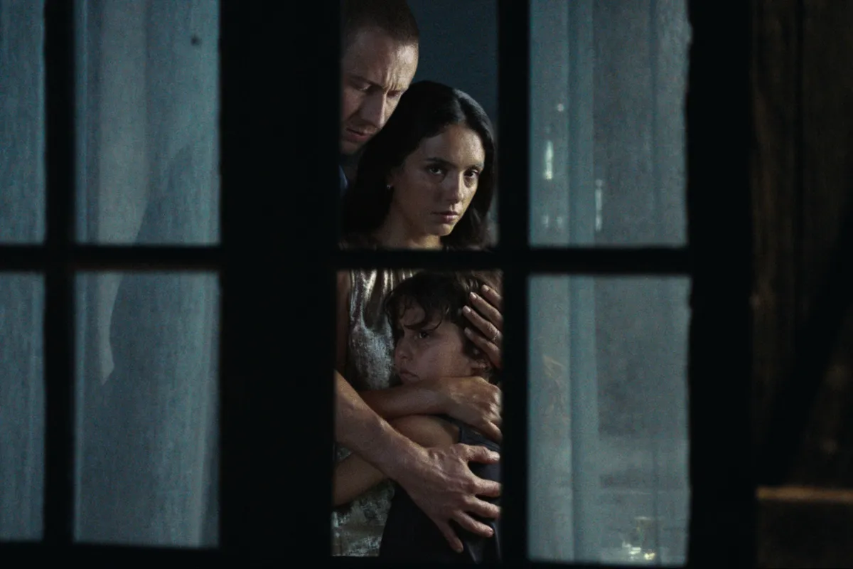 Hafsia Herzi and Benoît Magimel in a tense scene from 'The Birthday Party'.