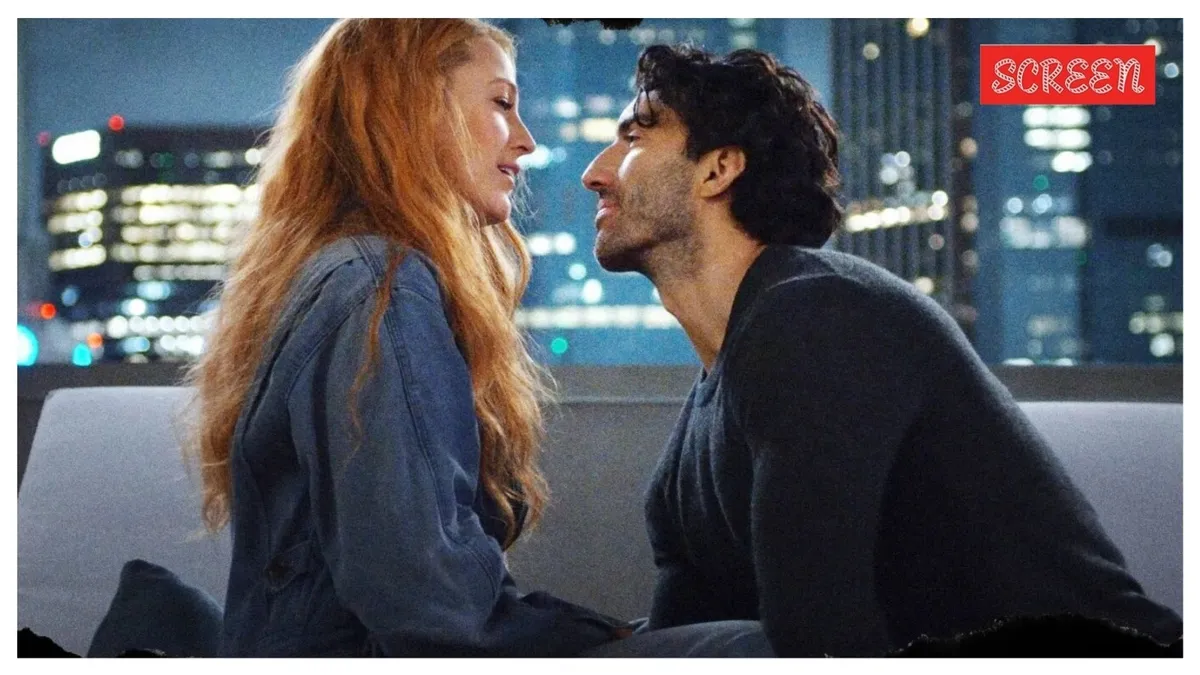 Blake Lively and Justin Baldoni posing at a movie premiere event.
