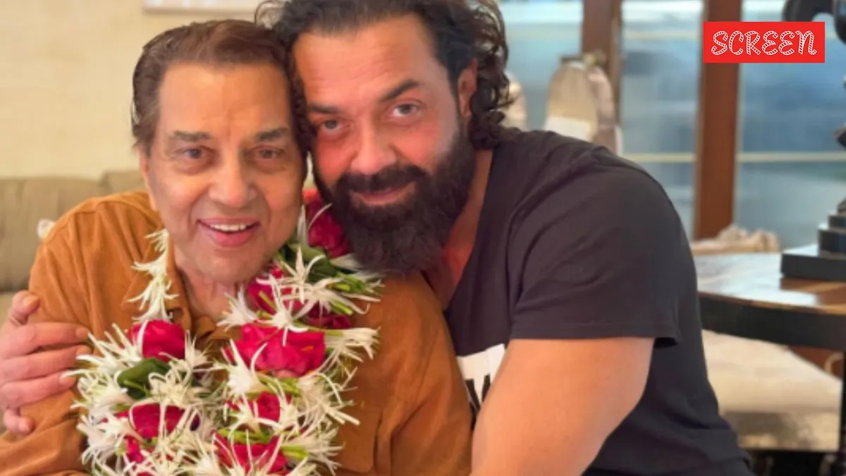 Bobby Deol looking emotional while speaking.