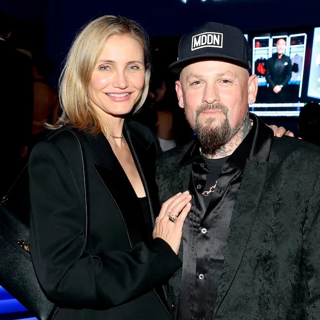 Cameron Diaz and Benji Madden smiling, perhaps holding a baby or celebrating family.