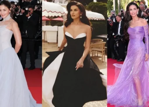 Celebrities posing on a red carpet at Cannes.