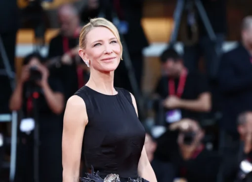 Cate Blanchett looking thoughtful and determined at a press event.