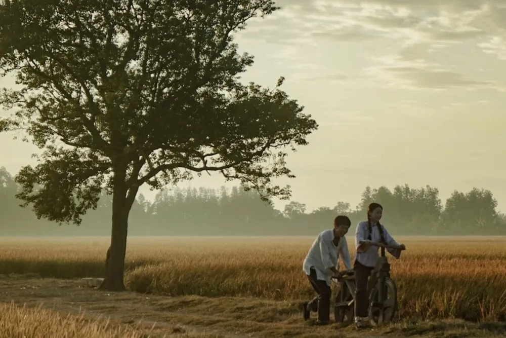 A scene from the Chinese family drama 'Dear You', showing characters in a warm, inviting setting.