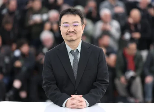 Director Yeon Sang-ho on the red carpet at the Cannes Film Festival.