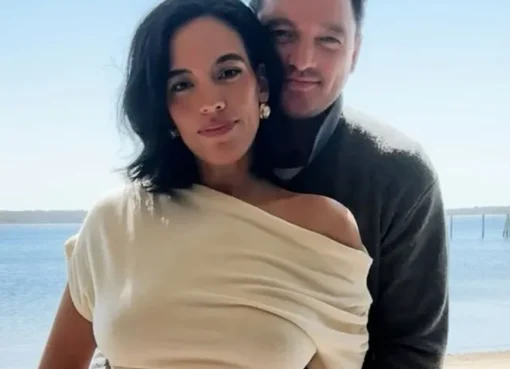 Danielle Olivera smiling, announcing her pregnancy.