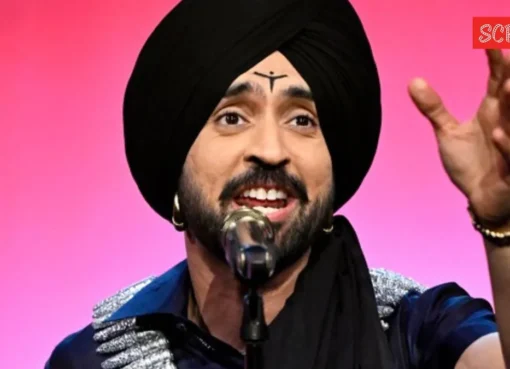 Diljit Dosanjh performing on stage in Florida, with bright lights and a crowd.