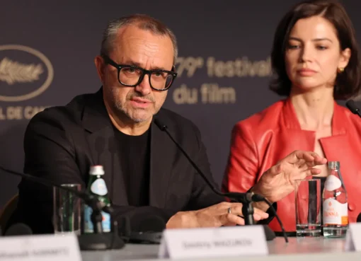 Andrey Zvyagintsev smiling at the Cannes Film Festival.