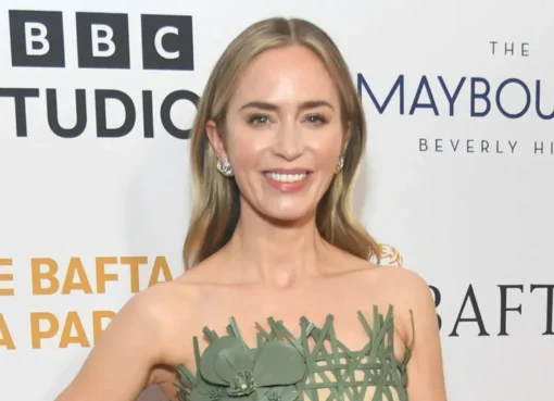 Emily Blunt on the red carpet looking confident and serious