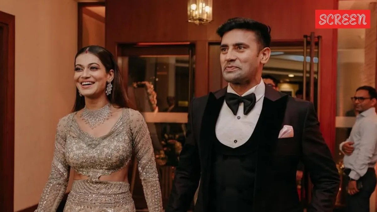 Sangram Singh and Payal Rohatgi smiling together, possibly at an event.