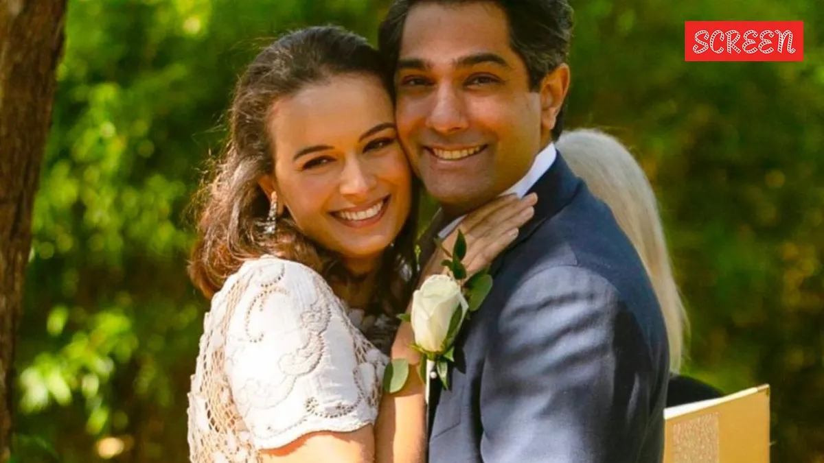 Evelyn Sharma smiling with Tushaan Bhindi, from happier times.