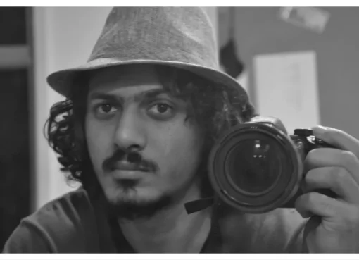 Portrait photo of Omar Salah Marei, an Egyptian filmmaker, with a gentle smile.