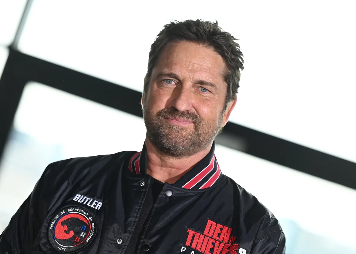 Gerard Butler as a serious-looking sniper.