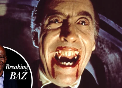 Christopher Lee as Dracula with blood on his fangs, looking menacing.