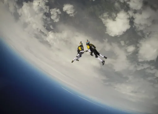 A thrilling image of aerial daredevils flying through the air.