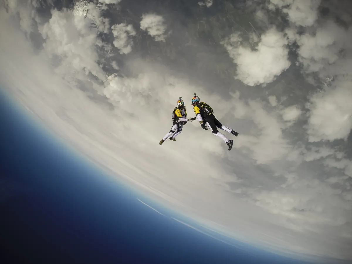 A thrilling image of aerial daredevils flying through the air.