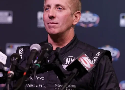 Photo of NASCAR driver Greg Biffle on a race track.
