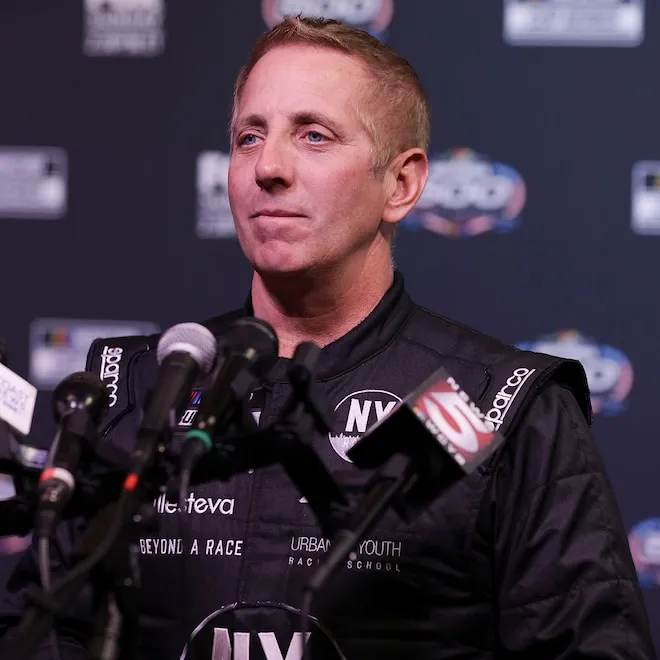 Photo of NASCAR driver Greg Biffle on a race track.