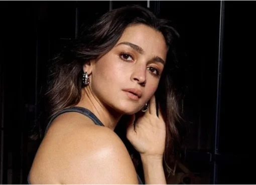 Alia Bhatt looking intense, possibly in a dark, action-packed scene.