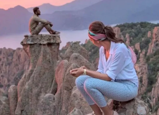 Ranbir Kapoor and Deepika Padukone in a romantic scene from the movie Tamasha, looking at each other intensely.