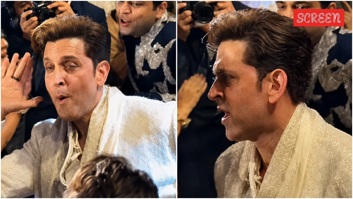 Hrithik Roshan dancing happily at a wedding event